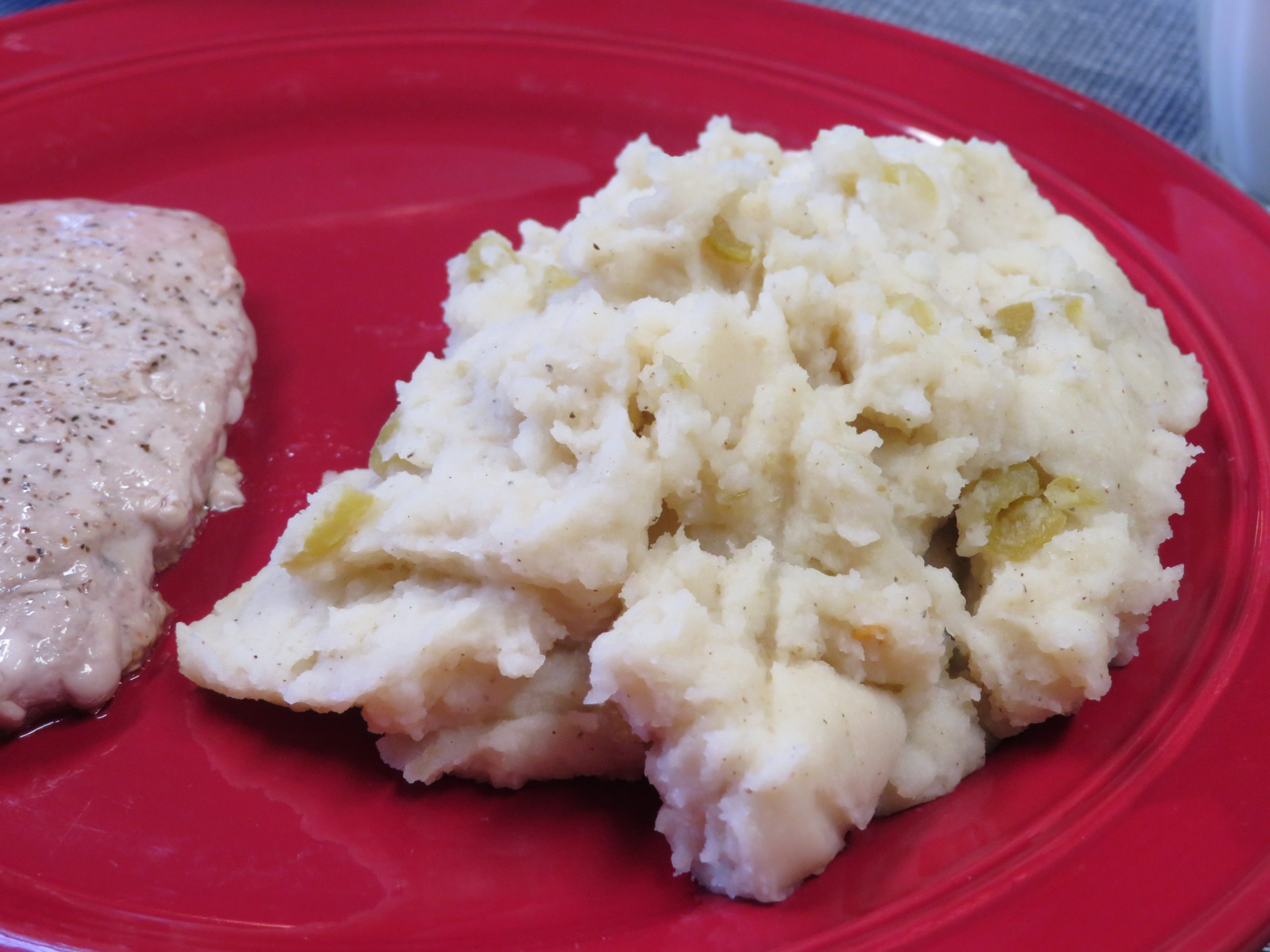 Seasoned Green Chile Potatoes on a plate