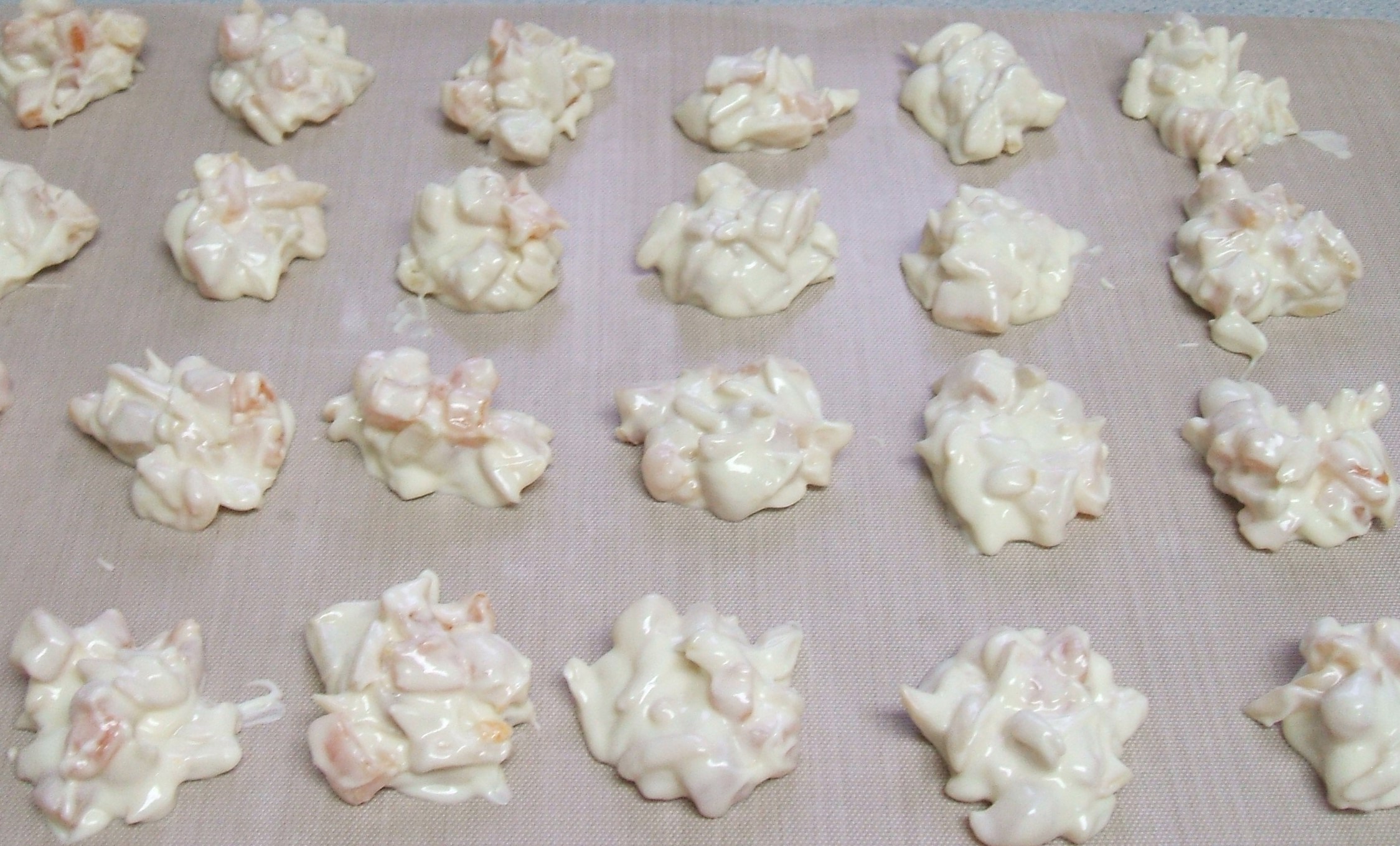 Apricot Almond Clusters cooling on a silicone sheet