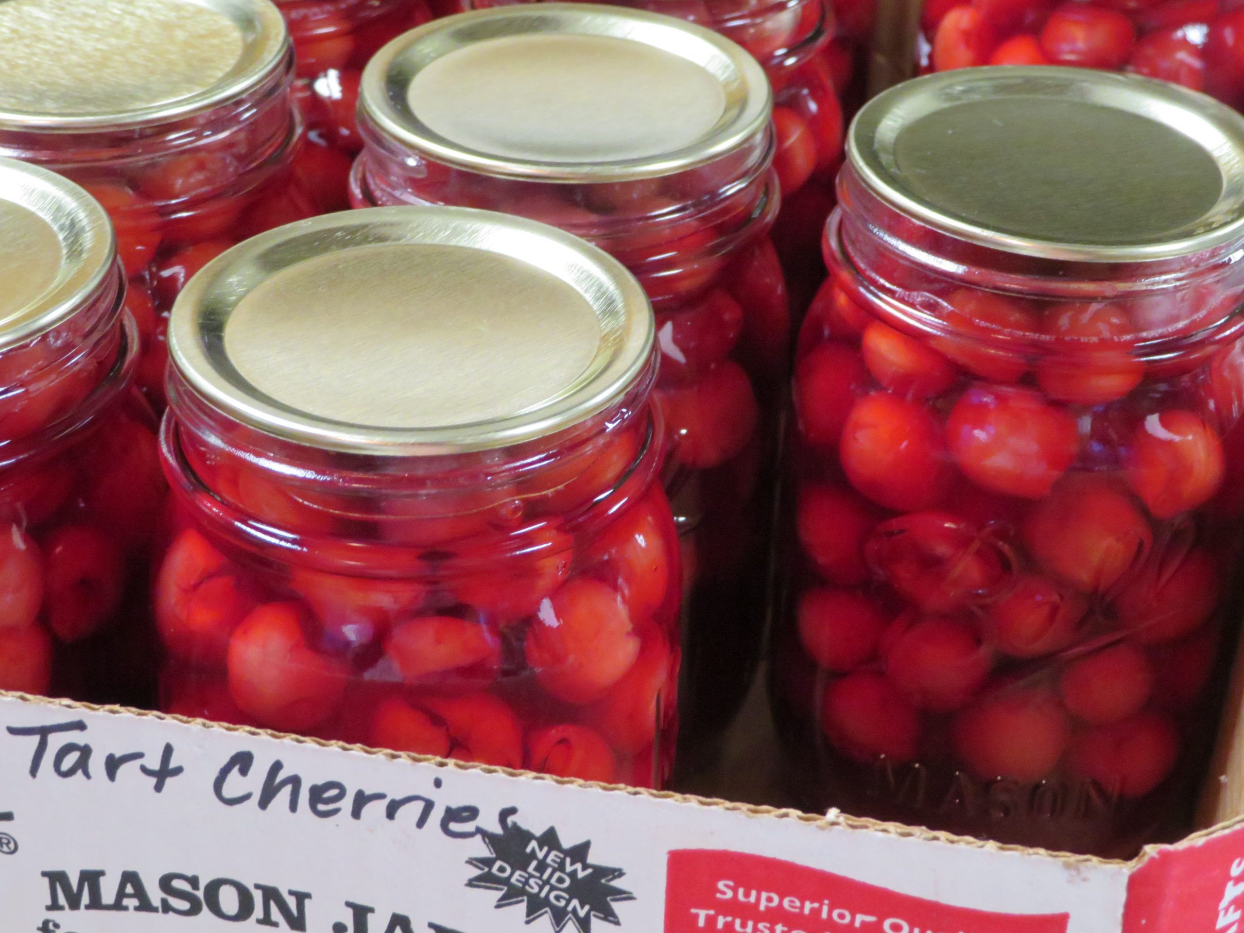 Pint jars of tart cherries