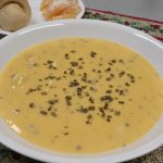 A bowl of baked potato soup