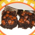 Two Mexican Chocolate Cake Brownies on a paper plate