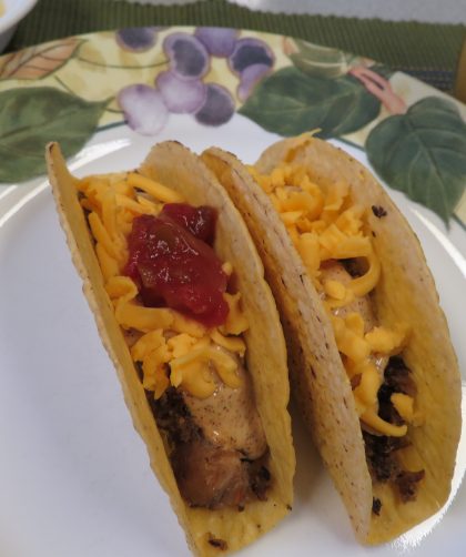 Fish tacos with chili lime creme on a plate