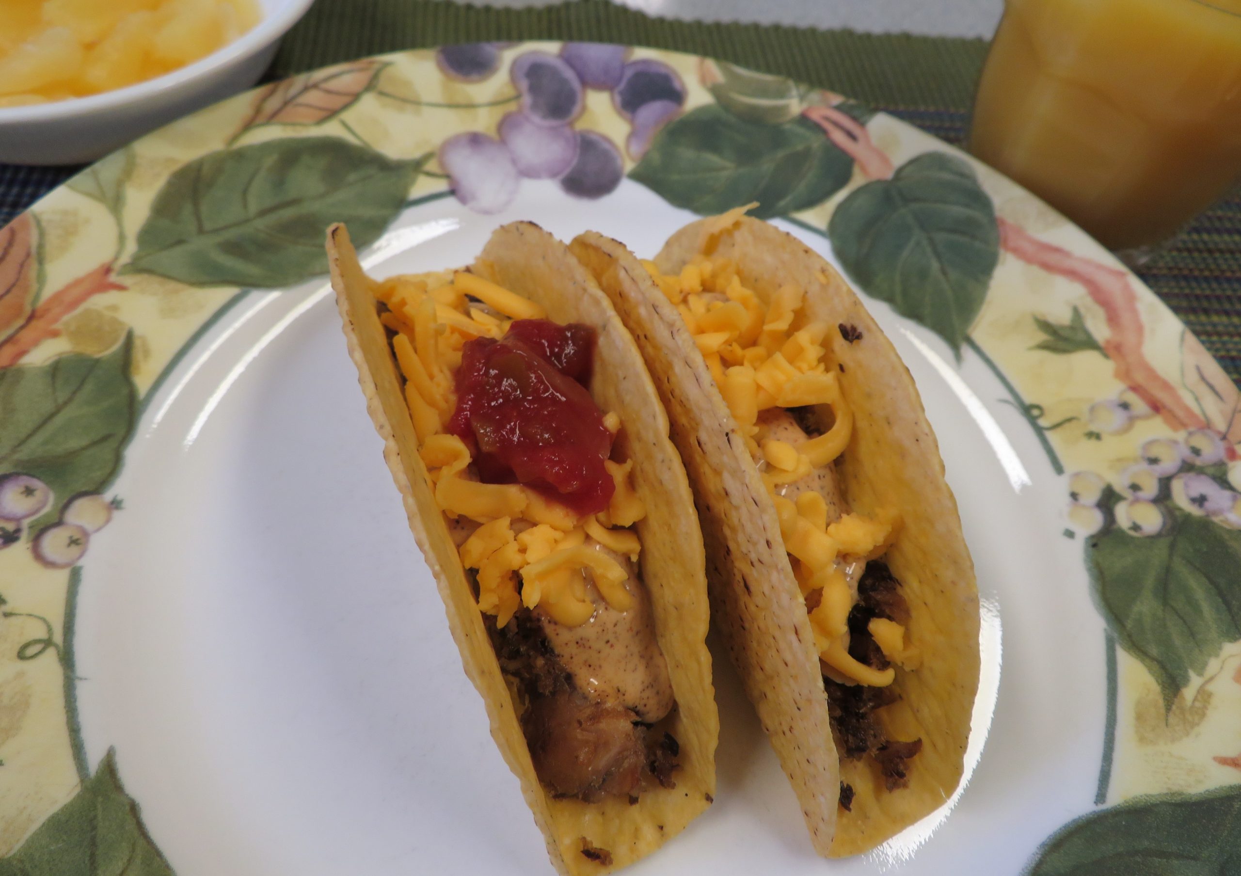 Fish tacos with chili lime creme on a plate