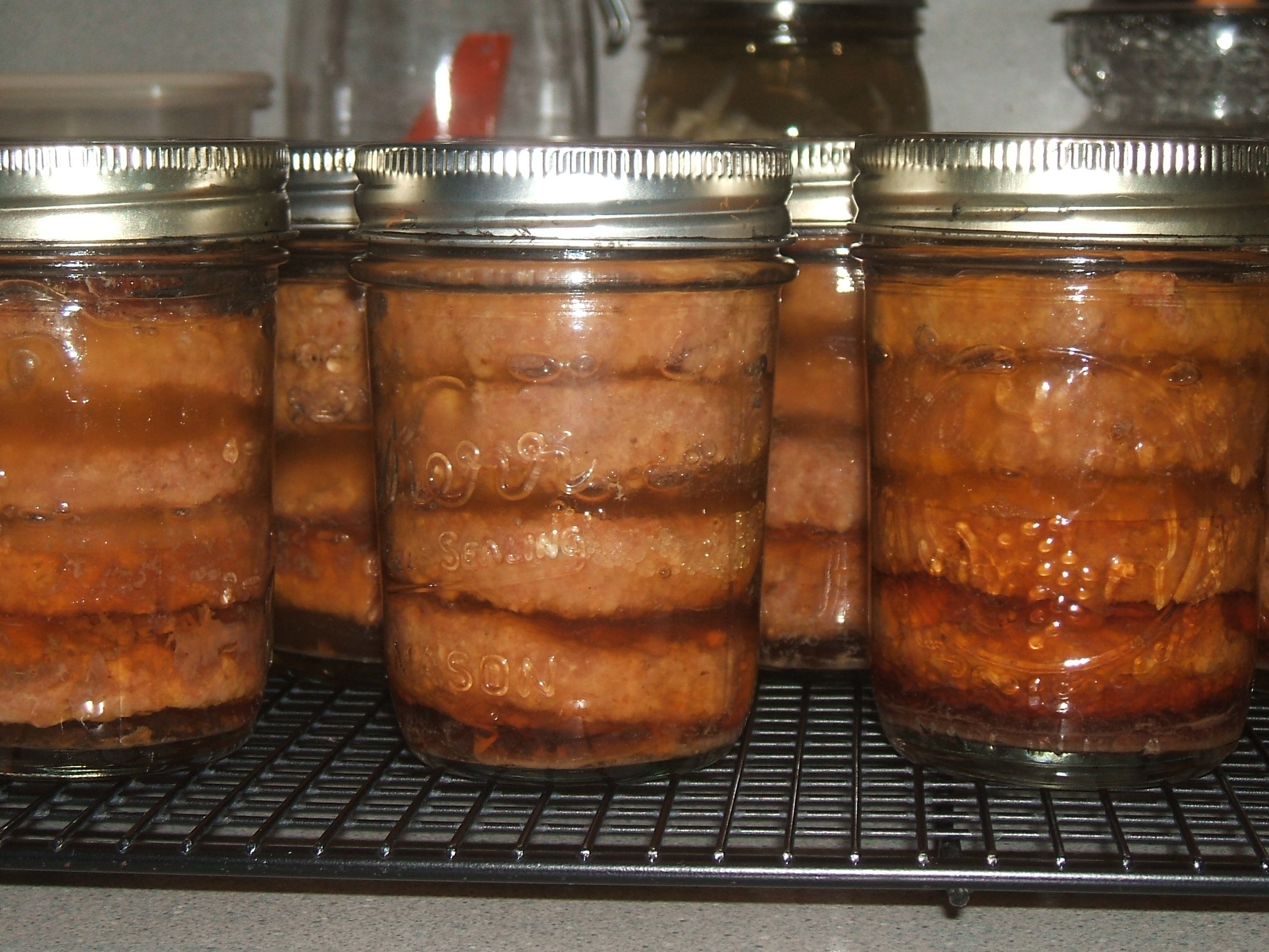 Half pint jars of sausage patties