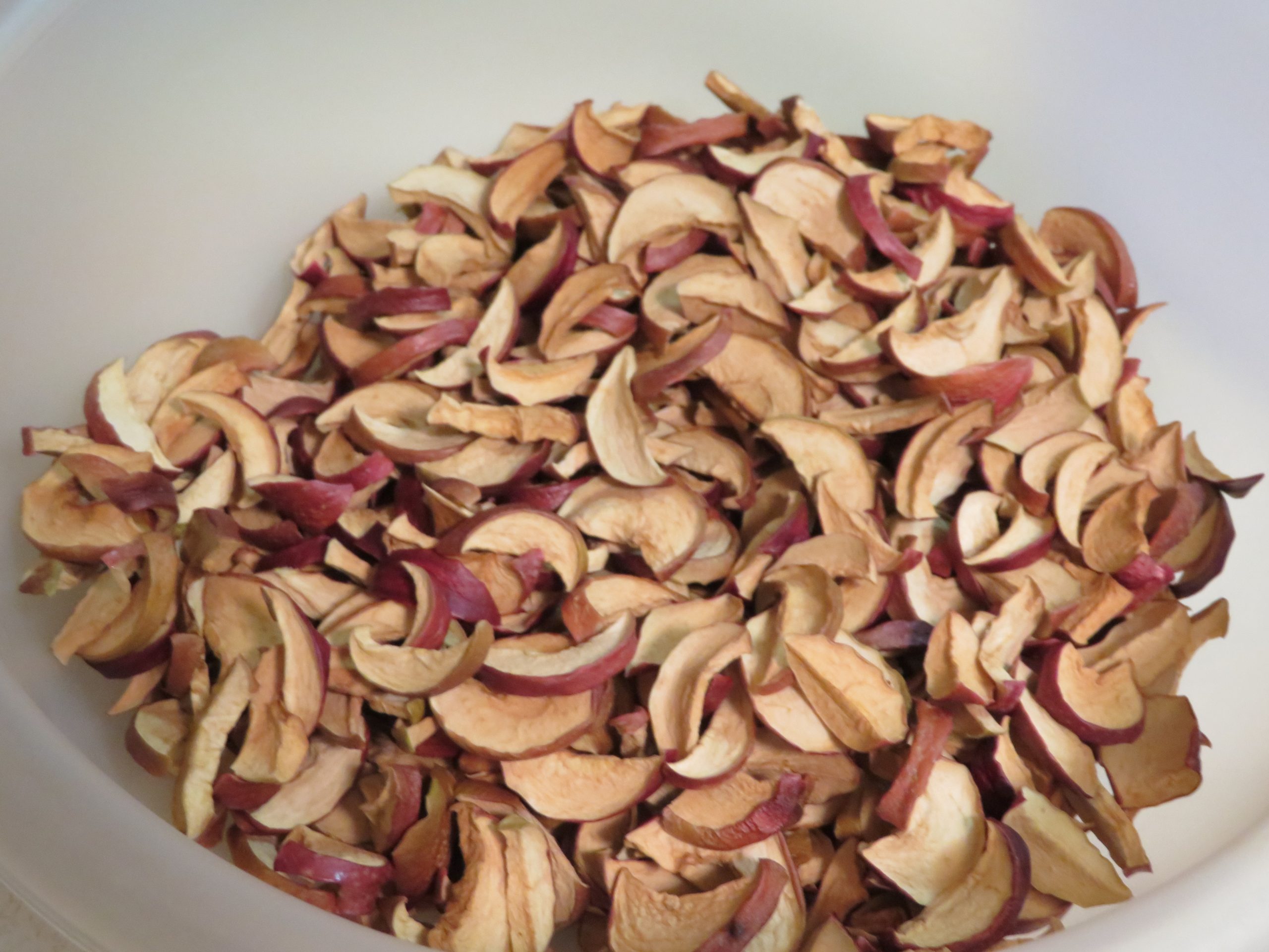 A bowl of small dried apples